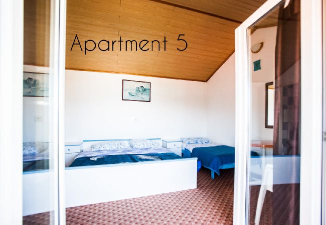 House in Lopar - Holiday Home in Lopar with Seaview, Terrace, Air condition, WIFI (186-5) House in Lopar - Holiday Home in Lopar with Seaview, Terrace, Air condition, WIFI (186-5)