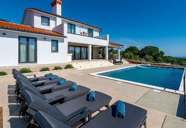 House in Labin - Holiday Home in Kapelica with Seaview, Terrace, Air condition, WIFI (5207-1) House in Labin - Holiday Home in Kapelica with Seaview, Terrace, Air condition, WIFI (5207-1)