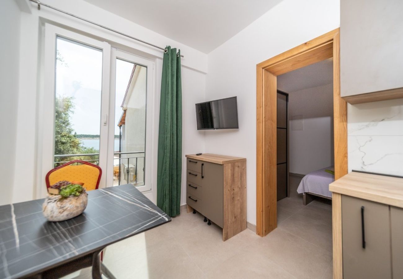 Apartment in Rab - Apartment in Barbat with sea view, dishwasher, air conditioning (660-6) Apartment in Rab - Apartment in Barbat with sea view, dishwasher, air conditioning (660-6)