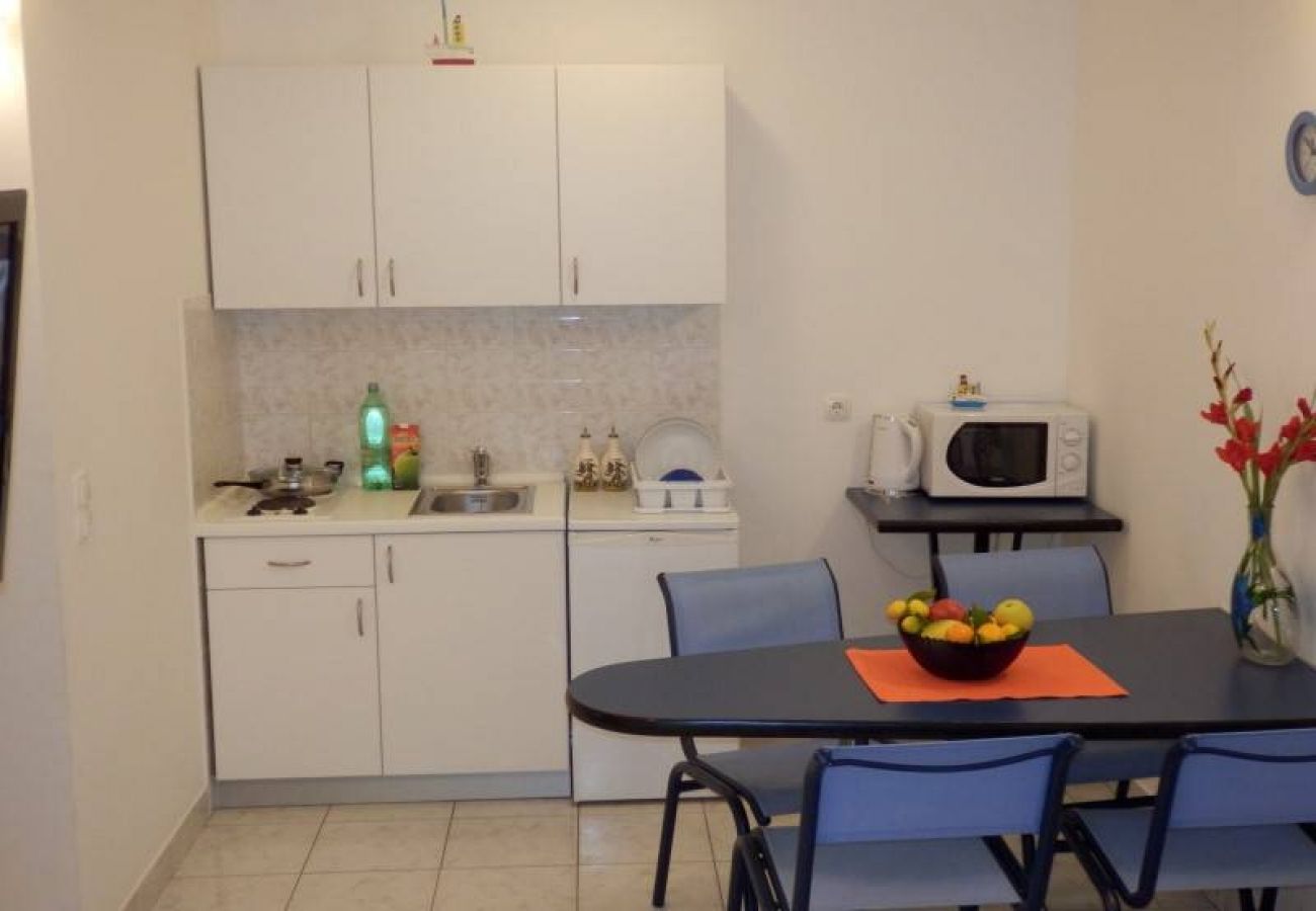 Apartamento en Duce - Apartamento en Duće con Terraza, Acondicionador, WIFI, Lavadora (4173-4)