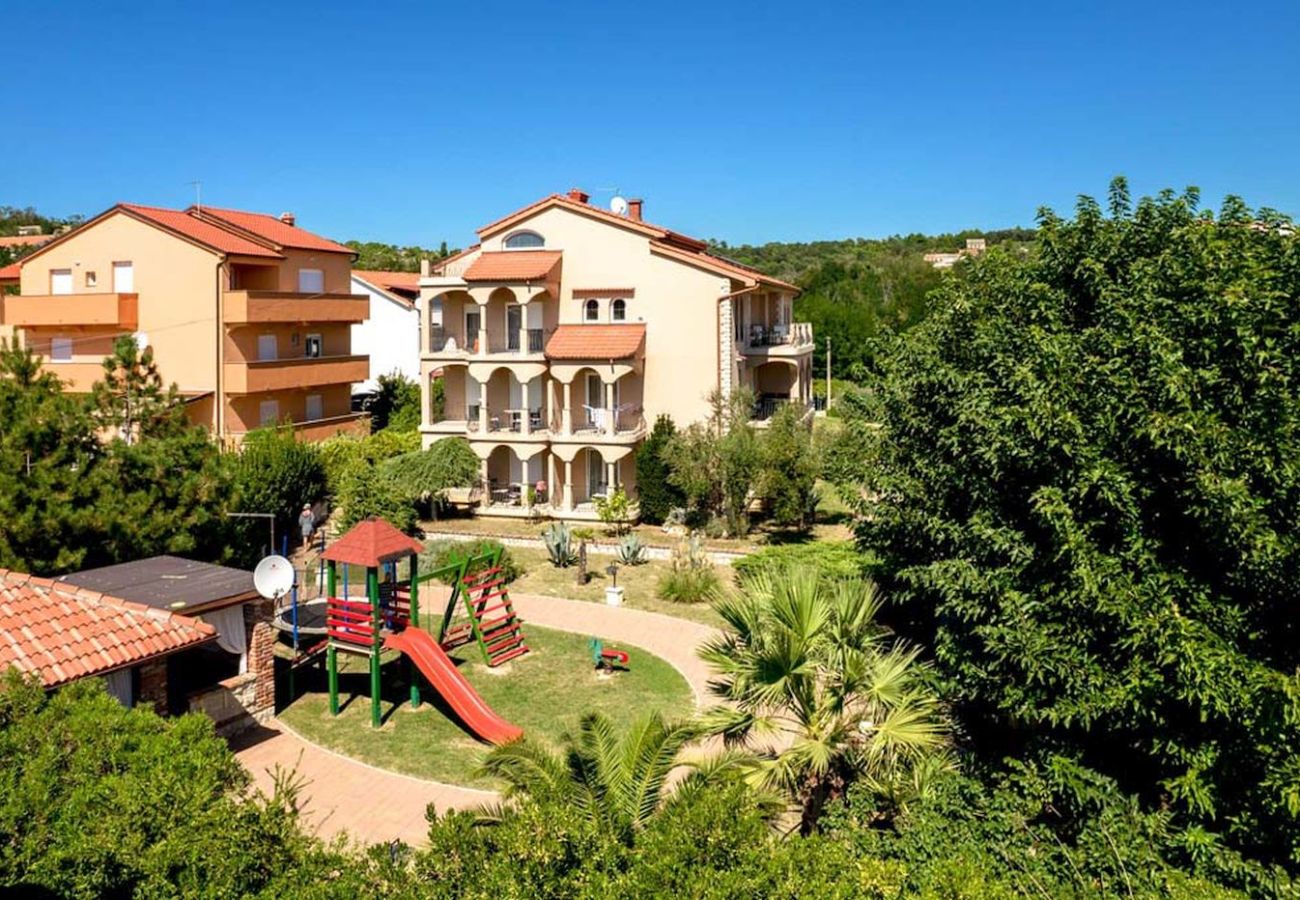 Apartamento en Lopar - Apartamento vacacional en Lopar con terraza, aire acondicionado, Wi-Fi y vista al mar (4738-7)