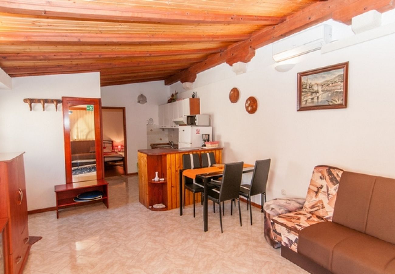 Maison à Veli Lošinj - Maison de vacances dans Veli Lošinj avec terrasse, Climatisation, WIFI, Machine à laver (63-1)