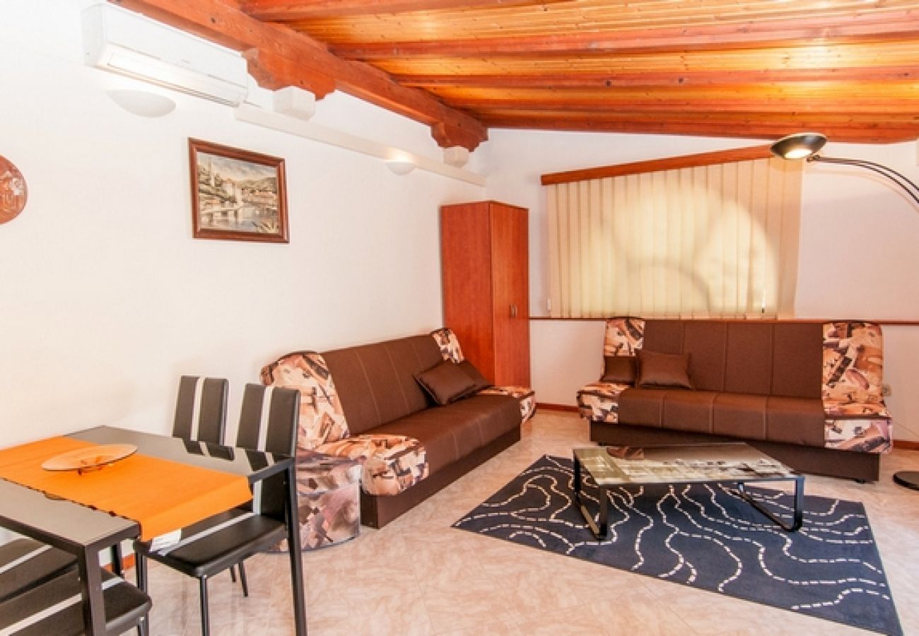 Maison à Veli Lošinj - Maison de vacances dans Veli Lošinj avec terrasse, Climatisation, WIFI, Machine à laver (63-1)