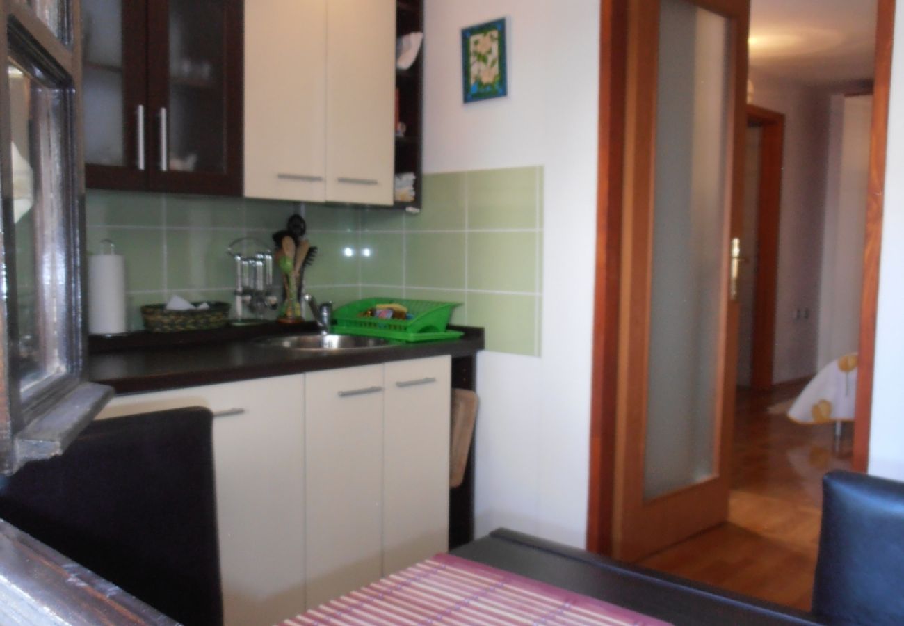 Appartement à Veli Lošinj - Appartement dans Veli Lošinj avec terrasse, Climatisation, WIFI, Machine à laver (63-2)