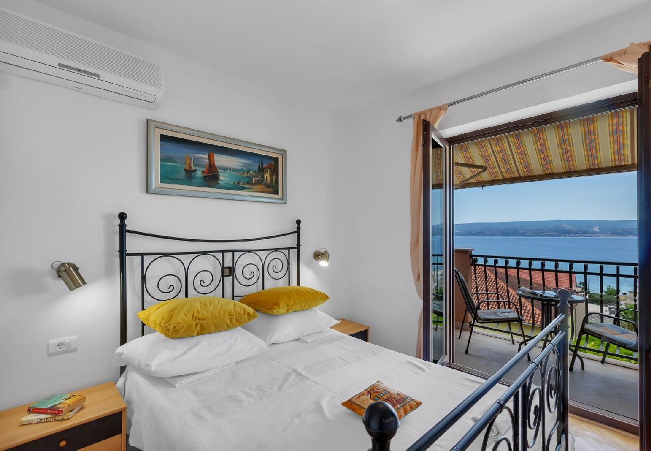 Chambres d'hôtes à Duce - Chambre dans Duće avec vue mer, Balcon, Climatisation, WIFI (79-1)