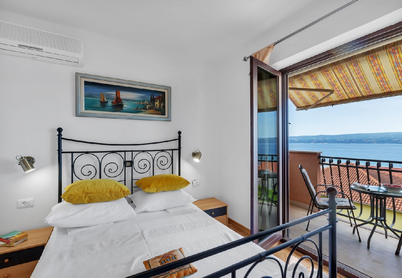 Chambres d'hôtes à Duce - Chambre dans Duće avec vue mer, Balcon, Climatisation, WIFI (79-1)