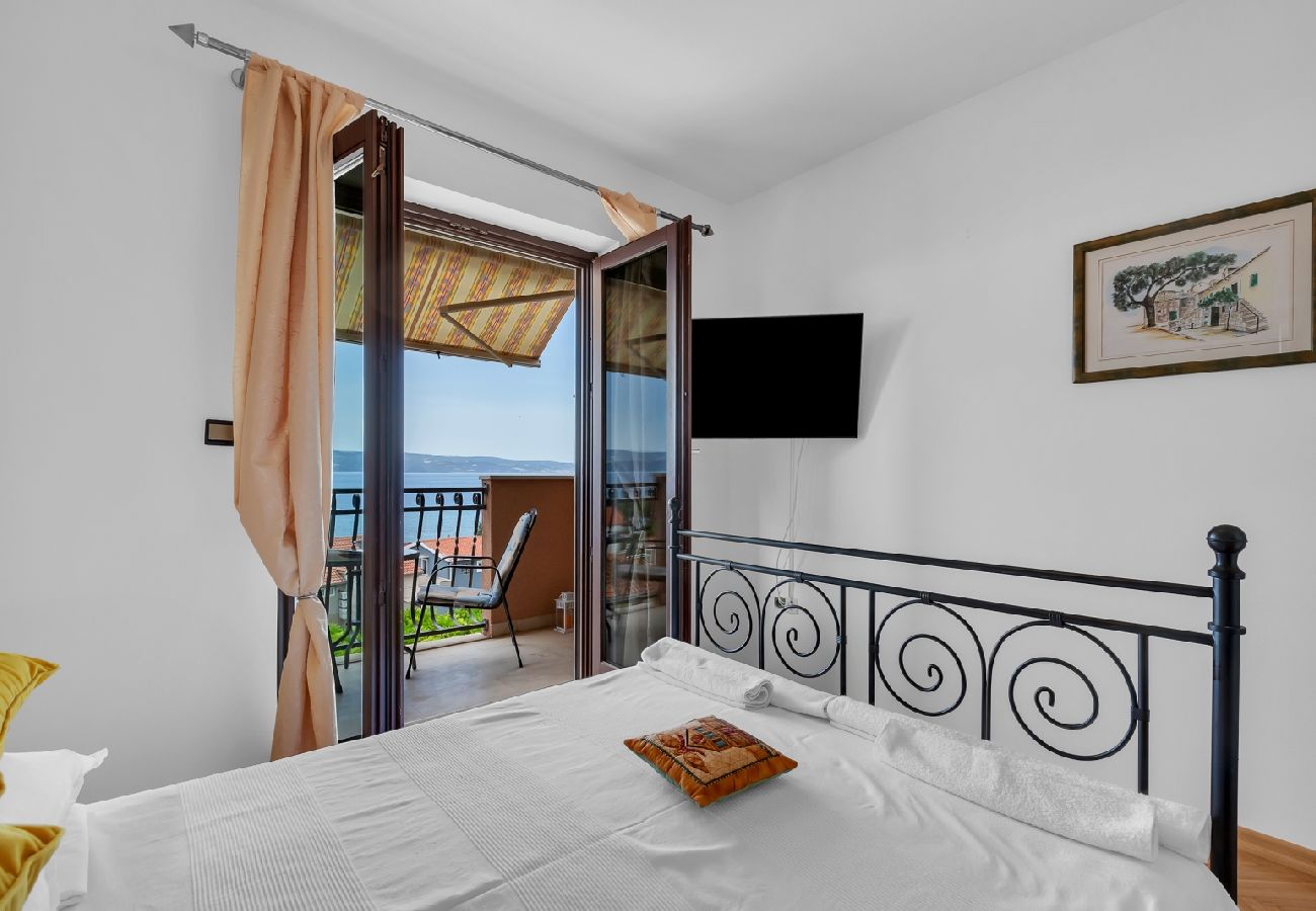 Chambres d'hôtes à Duce - Chambre dans Duće avec vue mer, Balcon, Climatisation, WIFI (79-1)