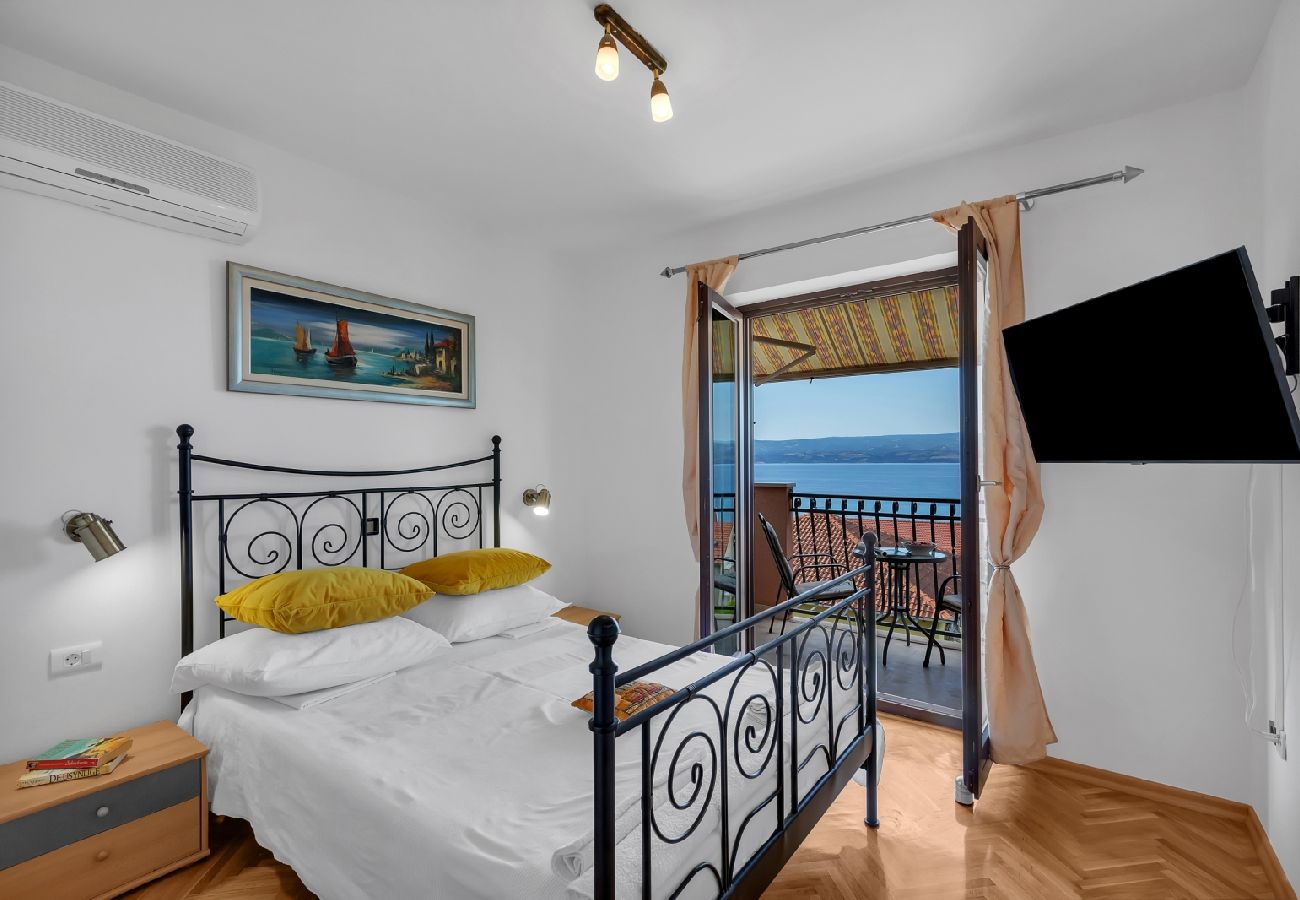 Chambres d'hôtes à Duce - Chambre dans Duće avec vue mer, Balcon, Climatisation, WIFI (79-1)