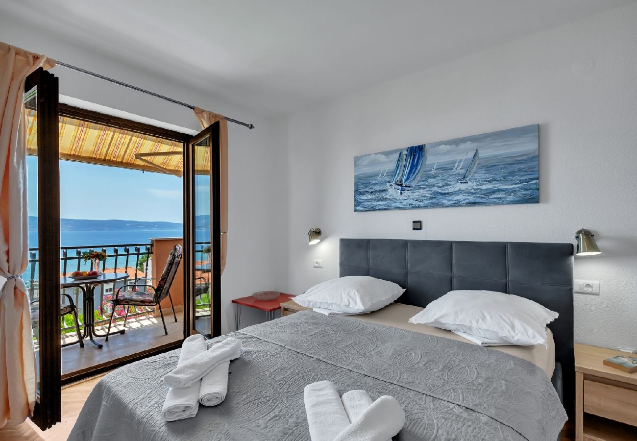 Chambres d'hôtes à Duce - Chambre dans Duće avec vue mer, Balcon, Climatisation, WIFI (79-3)