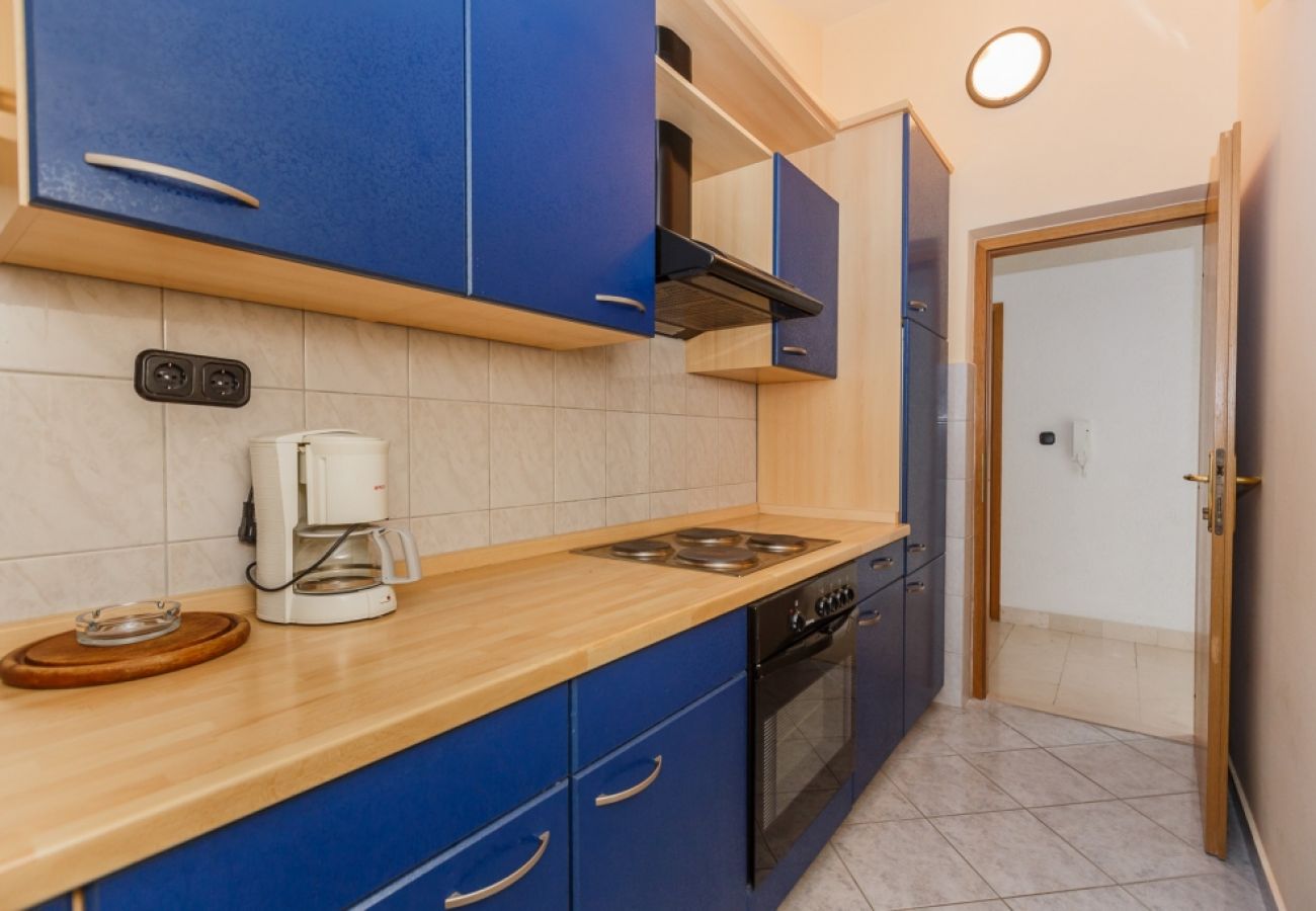 Chambres d'hôtes à Duce - Chambre dans Duće avec Balcon, Climatisation, WIFI (79-5)