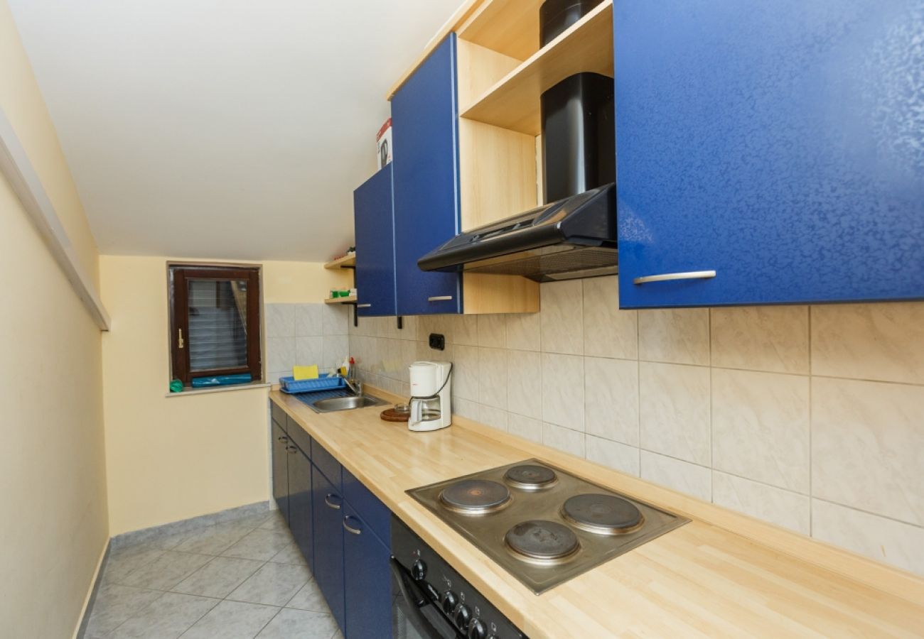 Chambres d'hôtes à Duce - Chambre dans Duće avec Balcon, Climatisation, WIFI (79-5)