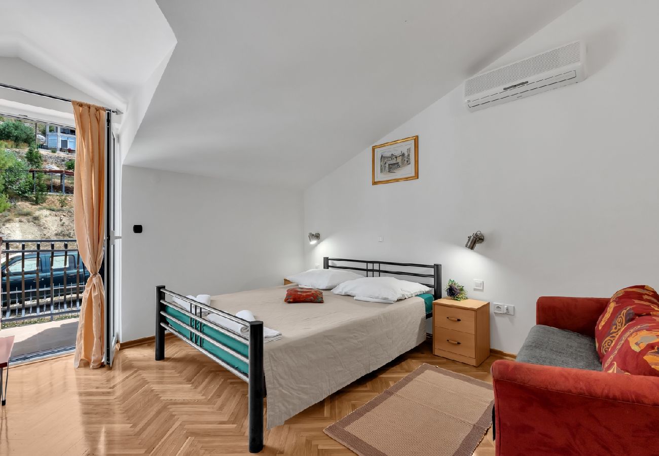 Chambres d'hôtes à Duce - Chambre dans Duće avec Balcon, Climatisation, WIFI (79-10)