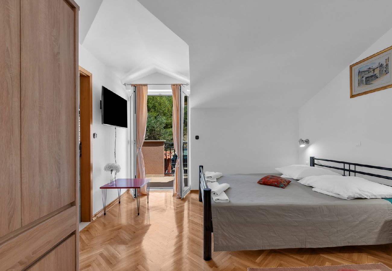 Chambres d'hôtes à Duce - Chambre dans Duće avec Balcon, Climatisation, WIFI (79-10)