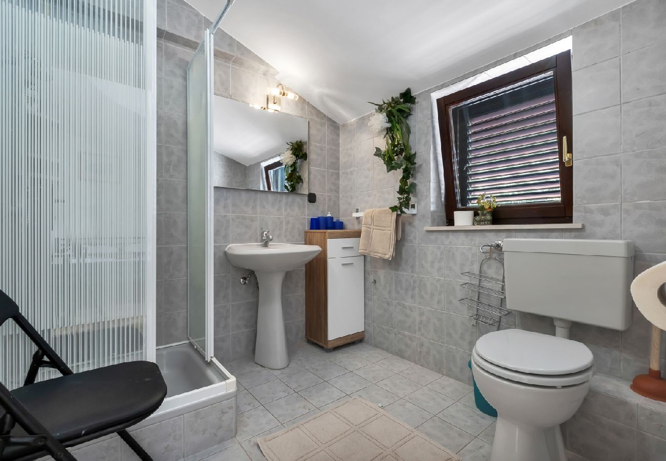 Chambres d'hôtes à Duce - Chambre dans Duće avec Balcon, Climatisation, WIFI (79-10)