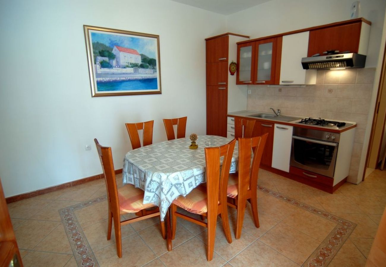 Maison à Lumbarda - Maison de vacances dans Lumbarda avec vue mer, terrasse, Climatisation, WIFI (128-4)