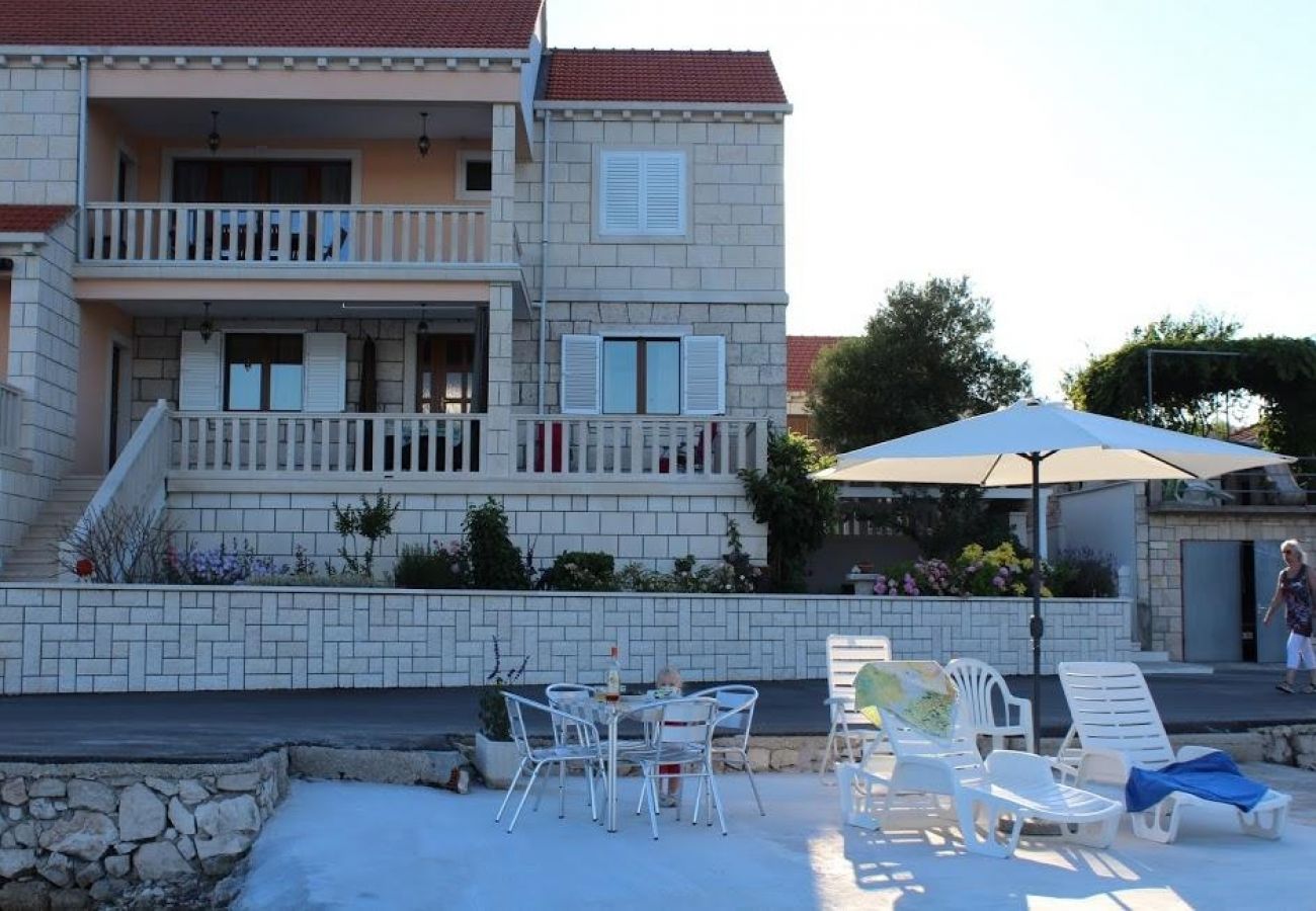 Maison à Lumbarda - Maison de vacances dans Lumbarda avec vue mer, terrasse, Climatisation, WIFI (128-4)