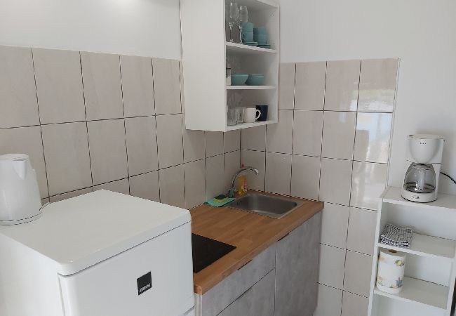 Appartement à Omiš - Appartement dans Omiš avec vue mer, terrasse, WIFI (161-2) Appartement à Omiš - Appartement dans Omiš avec vue mer, terrasse, WIFI (161-2)
