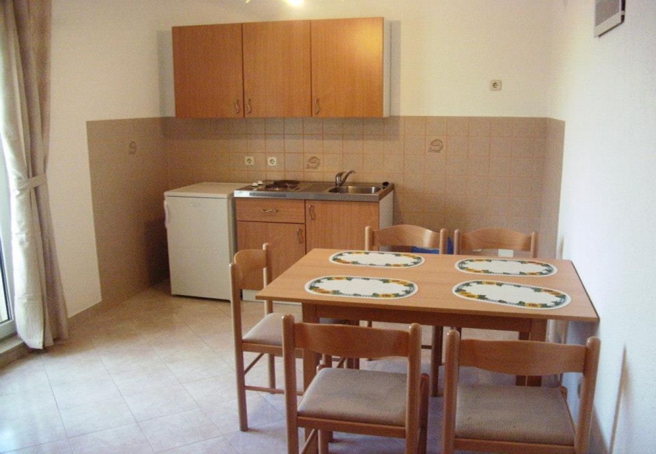 Appartement à Seget Vranjica - Appartement dans Seget Vranjica avec vue mer, Balcon, Climatisation, WIFI (608-1)