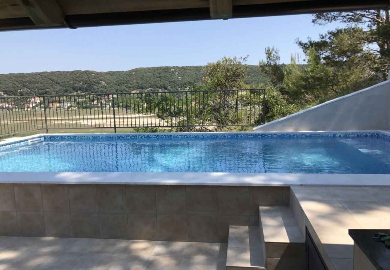 Appartement à Supetarska Draga - Appartement dans Supetarska Draga avec vue mer, Balcon, Climatisation, WIFI (3321-1)