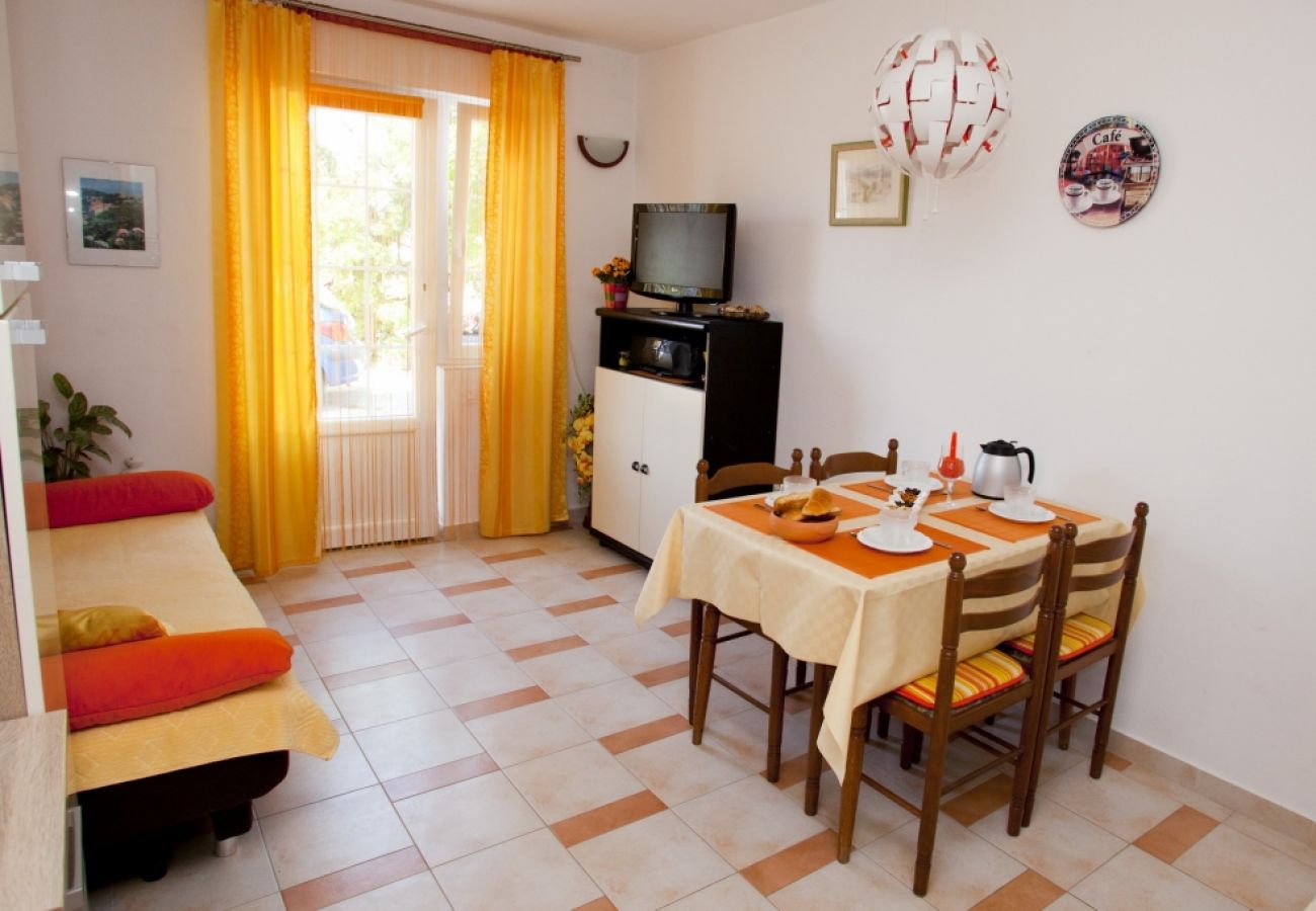 Appartement à Vrbnik - Appartement dans Vrbnik avec vue mer, terrasse, Climatisation, WIFI (879-1)