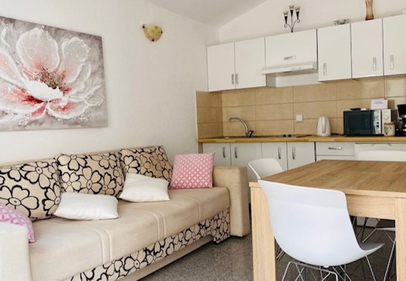 Appartement à Povlja - Appartement dans Povlja avec terrasse, Climatisation, WIFI, Machine à laver (3419-3)