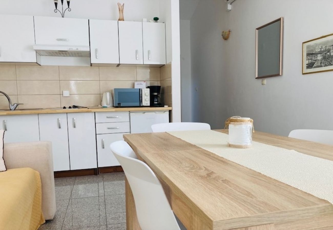 Appartement à Povlja - Appartement dans Povlja avec terrasse, Climatisation, WIFI, Machine à laver (3419-3)