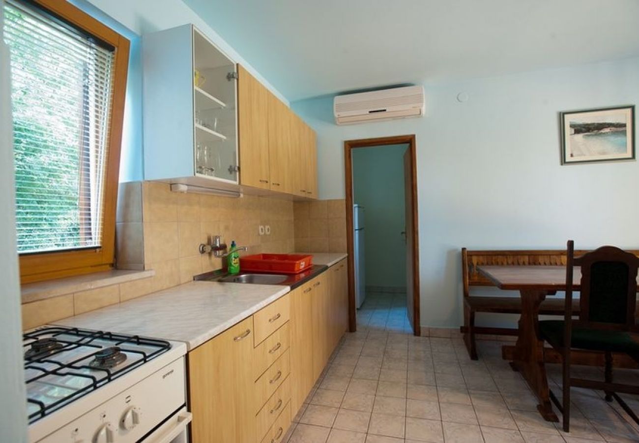 Appartement à Povile - Appartement dans Povile avec terrasse, Climatisation, WIFI, Machine à laver (3542-3)