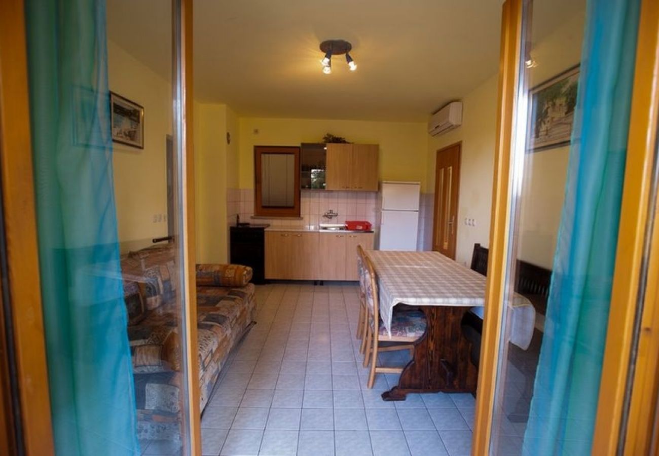 Appartement à Povile - Appartement dans Povile avec terrasse, Climatisation, WIFI, Machine à laver (3542-4)