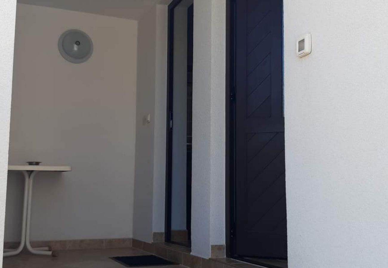 Appartement à Novalja - Appartement dans Novalja avec vue mer, terrasse, Climatisation, WIFI (3572-1)