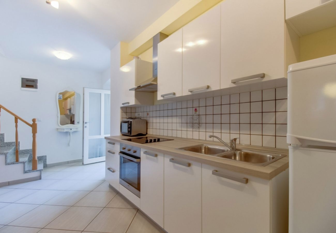 Appartement à Mali Lošinj - Appartement dans Mali Lošinj avec terrasse, Climatisation, Machine à laver (3683-1)