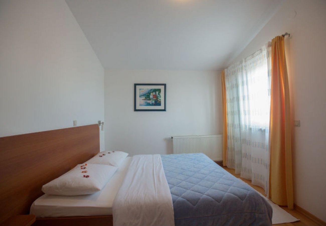 Chambres d'hôtes à Novalja - Chambre dans Novalja avec Balcon, Climatisation, WIFI (3764-2)