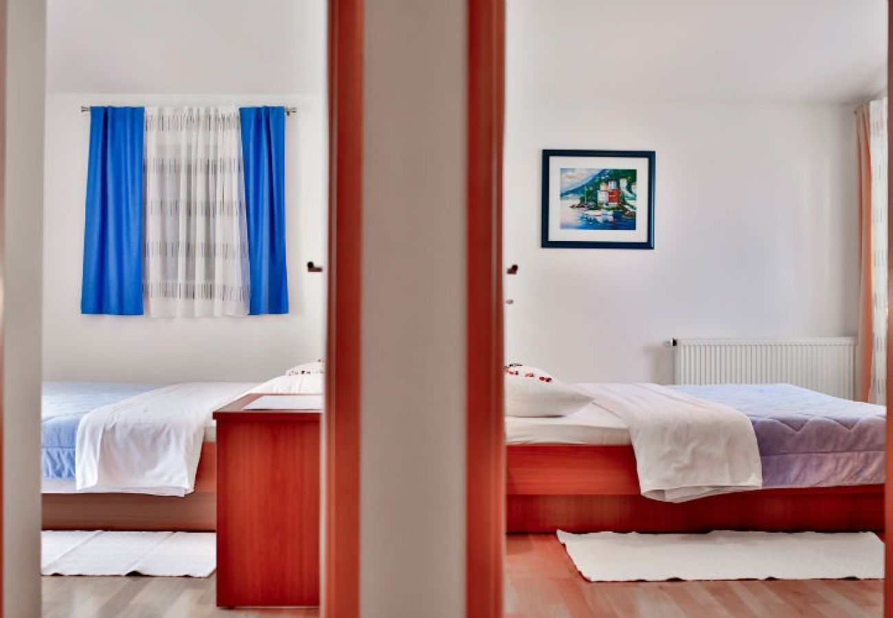 Chambres d'hôtes à Novalja - Chambre dans Novalja avec Balcon, Climatisation, WIFI (3764-2)