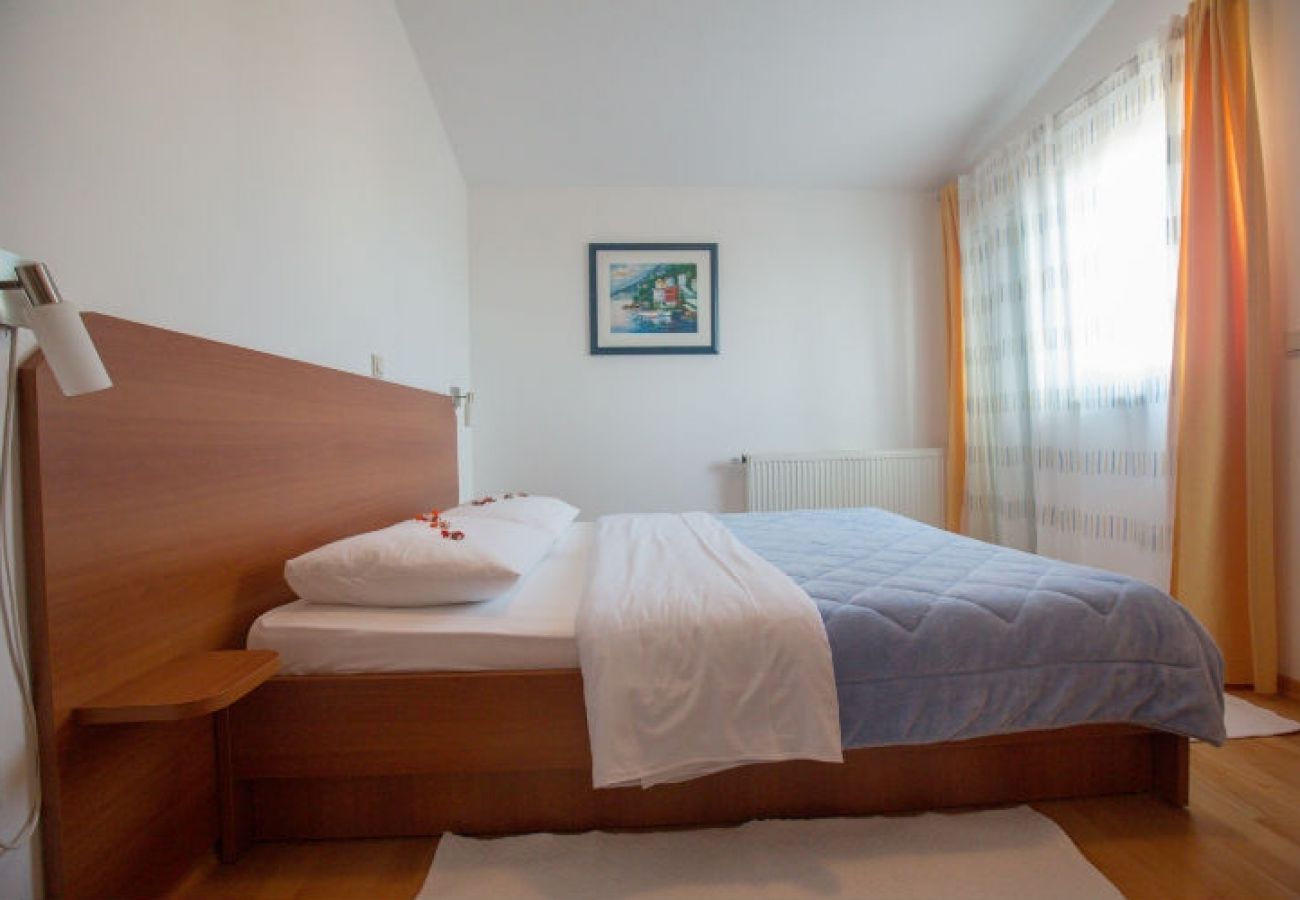 Chambres d'hôtes à Novalja - Chambre dans Novalja avec Balcon, Climatisation, WIFI (3764-2)