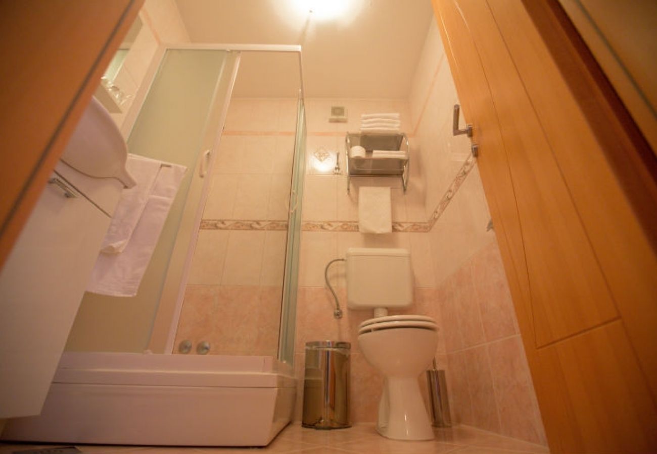 Chambres d'hôtes à Novalja - Chambre dans Novalja avec Balcon, Climatisation, WIFI (3764-2)