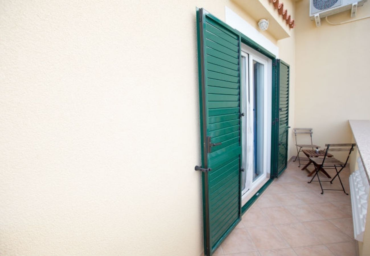 Chambres d'hôtes à Novalja - Chambre dans Novalja avec Balcon, Climatisation, WIFI (3764-2)