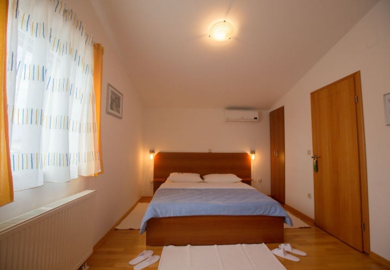 Chambres d'hôtes à Novalja - Chambre dans Novalja avec Climatisation, WIFI (3764-3)