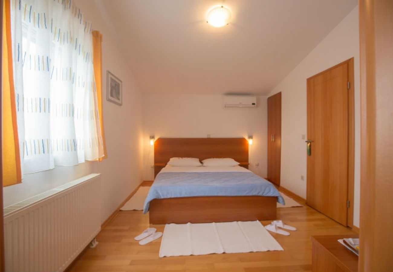 Chambres d'hôtes à Novalja - Chambre dans Novalja avec Climatisation, WIFI (3764-3)