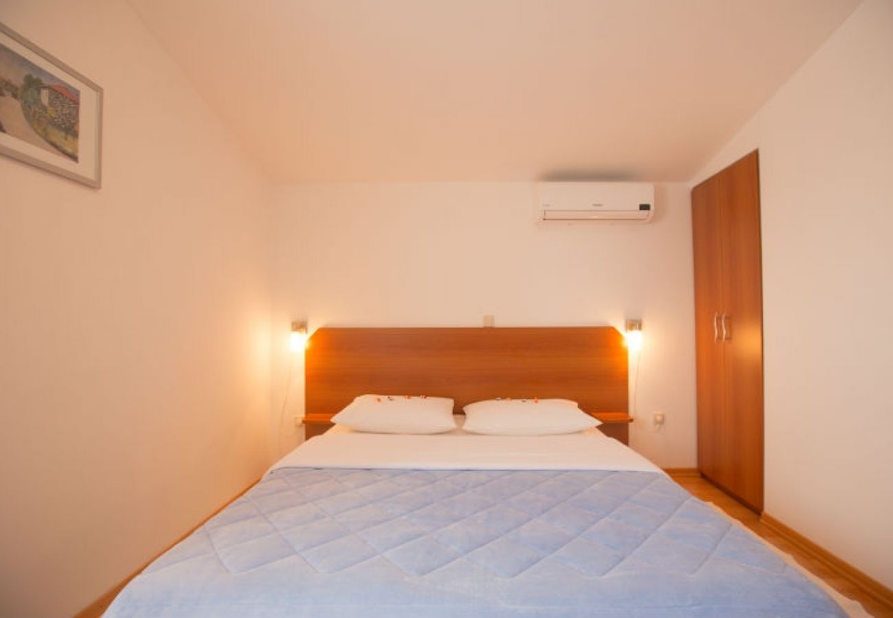 Chambres d'hôtes à Novalja - Chambre dans Novalja avec Climatisation, WIFI (3764-3)