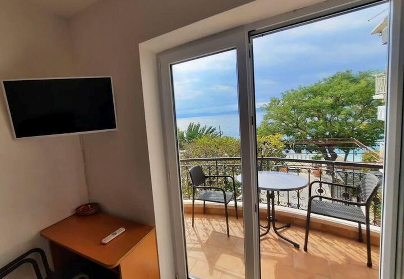 Appartement à Podgora - Appartement dans Podgora avec vue mer, terrasse, Climatisation, WIFI (3812-2)