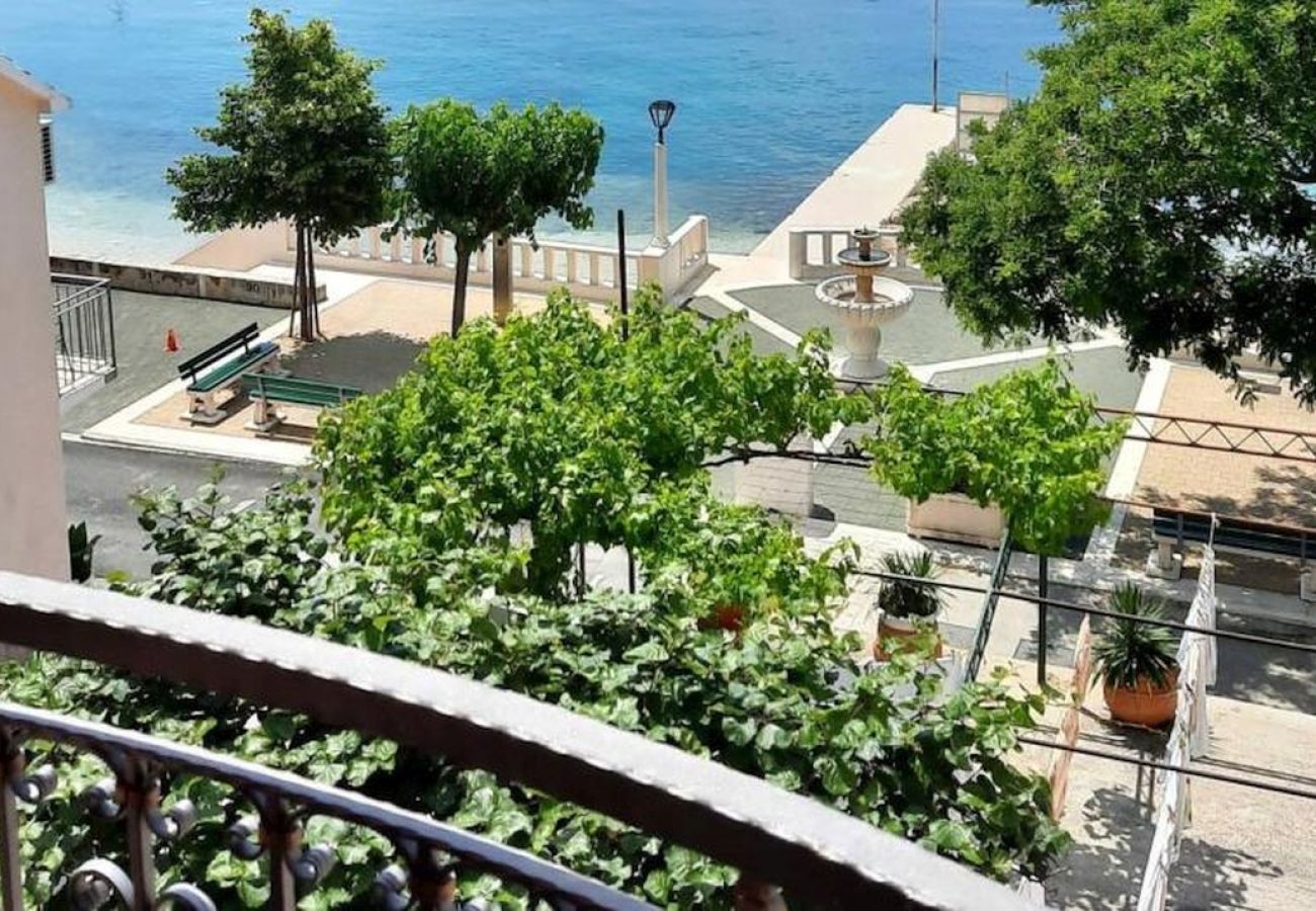 Appartement à Podgora - Appartement dans Podgora avec vue mer, terrasse, Climatisation, WIFI (3812-2)