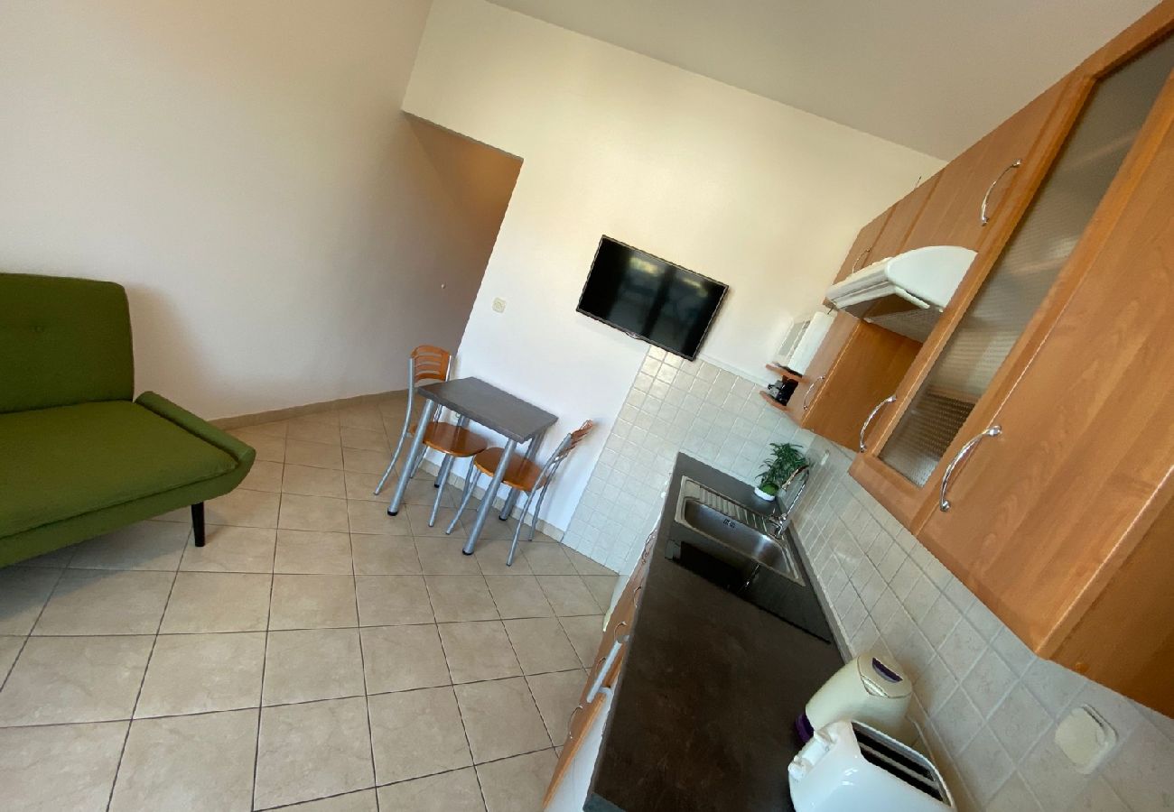 Appartement à Punat - Appartement dans Punat avec terrasse, Climatisation, WIFI, Machine à laver (3829-3)