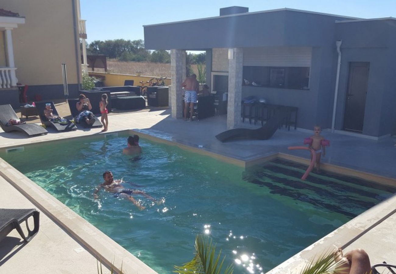 Chambres d'hôtes à Nin - Chambre dans Zaton (Zadar) avec vue mer, terrasse, WIFI, Machine à laver (4141-6)