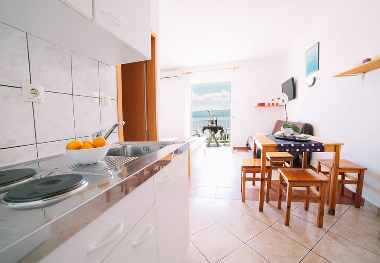 Appartement à Duce - Appartement dans Duće avec vue mer, Balcon, Climatisation, WIFI (4167-1)