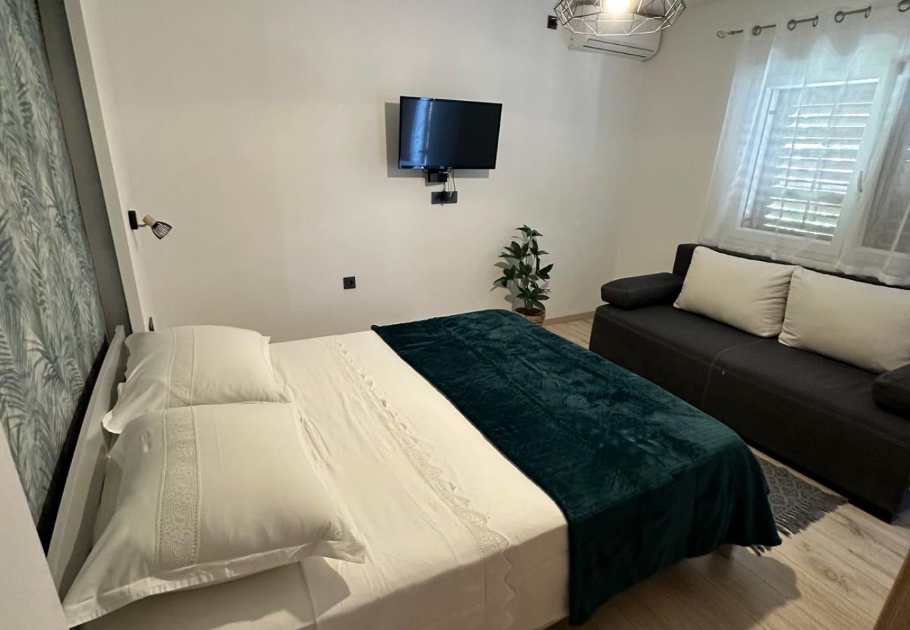 Appartement à Trpanj - Appartement dans Trpanj avec terrasse, Climatisation, WIFI, Machine à laver (4199-3)