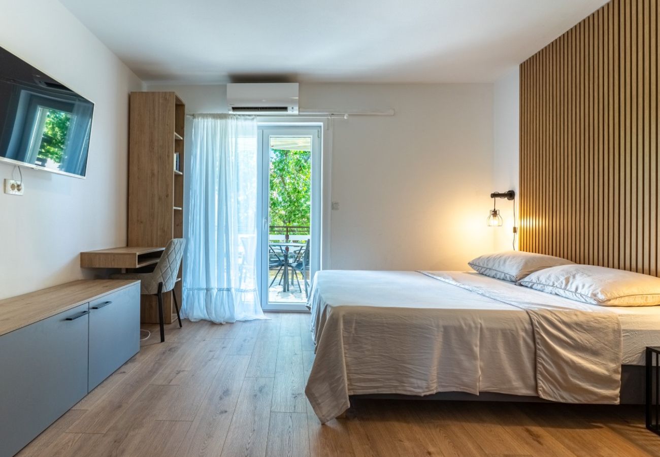 Appartement à Cres - Appartement dans Cres avec Balcon, Climatisation, WIFI, Machine à laver (4249-2)