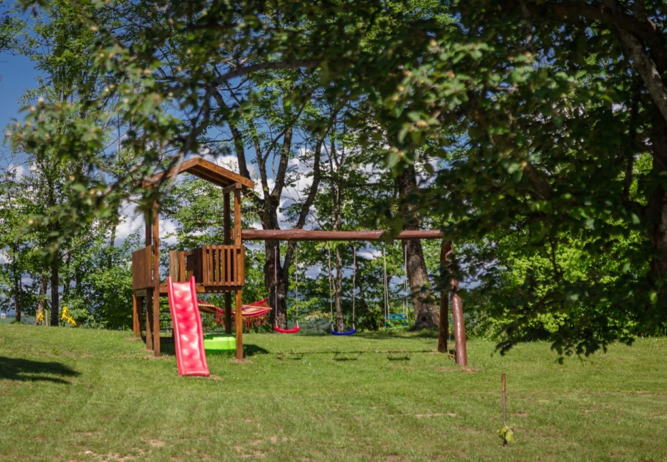 Maison à Rakovica - Maison de vacances dans Rakovica avec terrasse, WIFI, Machine à laver (4488-2)