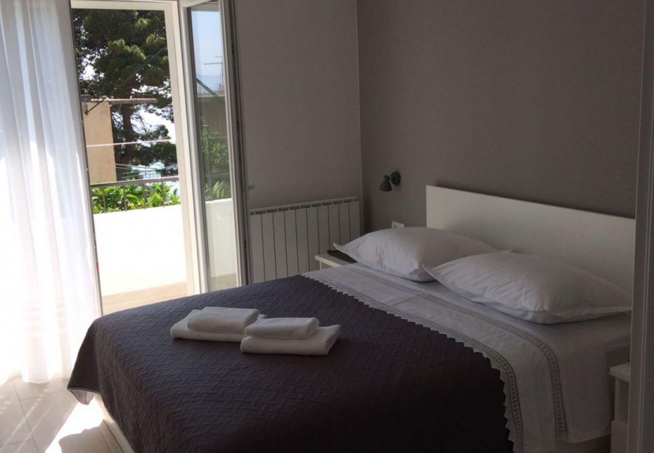 Appartement à Podgora - Appartement dans Podgora avec vue mer, terrasse, Climatisation, WIFI (4492-3)