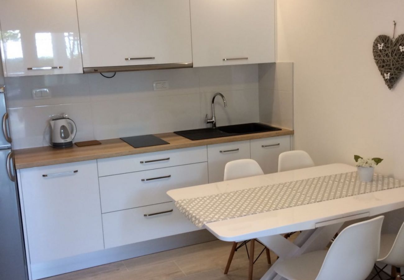 Appartement à Podgora - Appartement dans Podgora avec vue mer, terrasse, Climatisation, WIFI (4492-1)