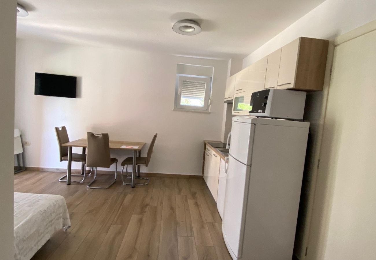 Appartement à Punat - Appartement dans Punat avec terrasse, Climatisation, WIFI, Machine à laver (4534-3)