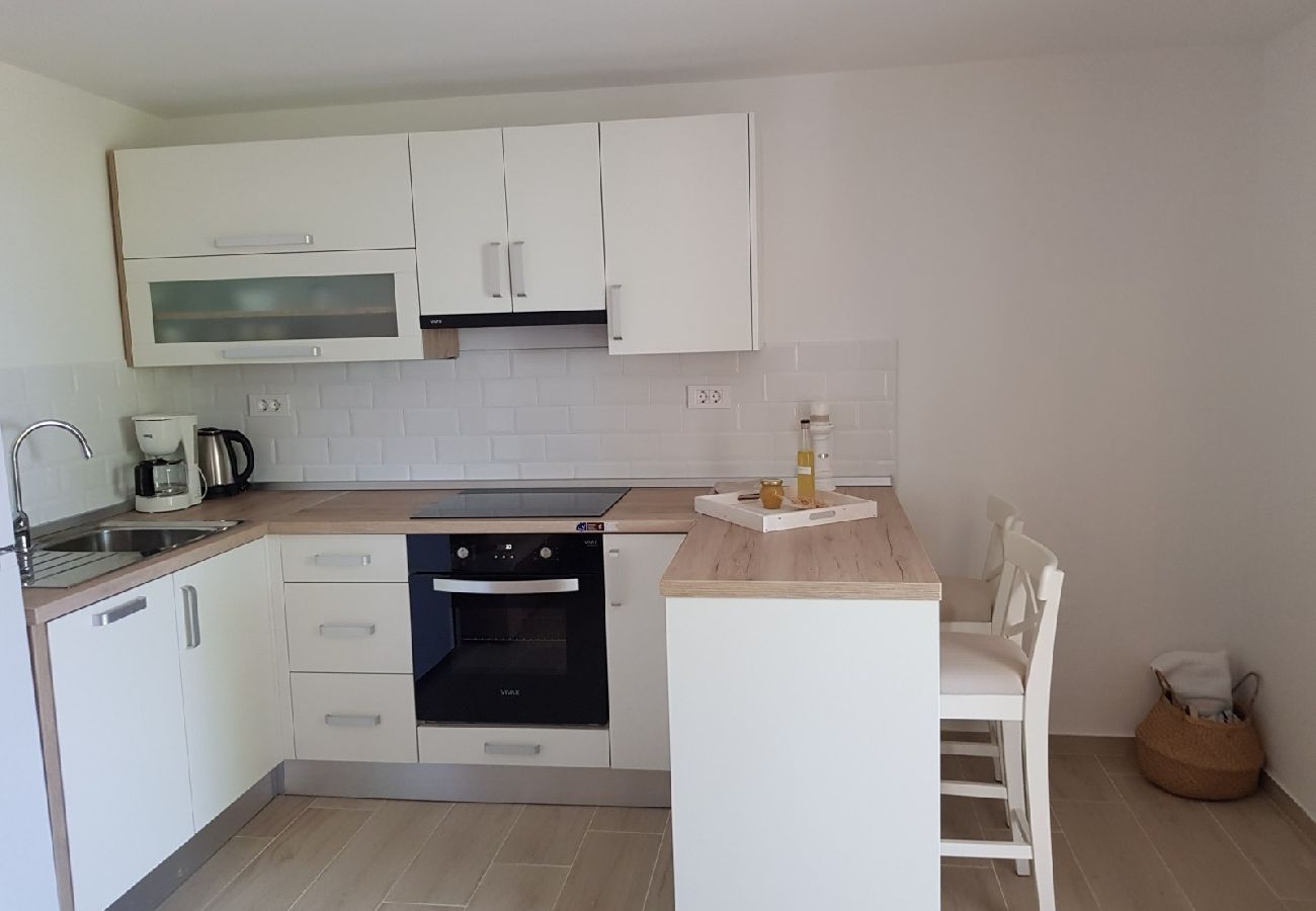 Appartement à Supetarska Draga - Appartement dans Supetarska Draga avec vue mer, terrasse, Climatisation, WIFI (4552-6)